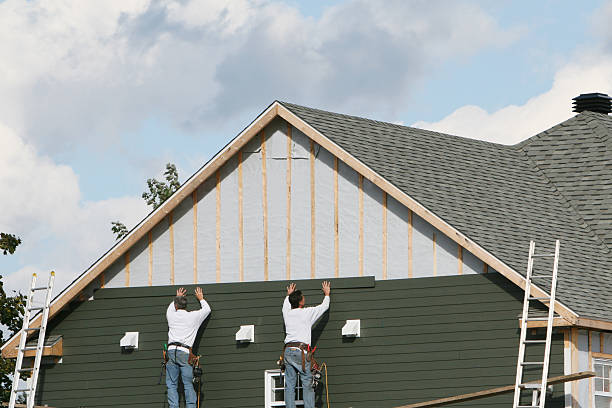 Professional Vinyl Siding technician working in Covesville, VA